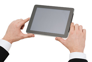 Image showing close up of man hands holding tablet pc