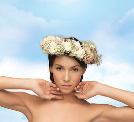 Image showing beautiful woman wearing wreath of flowers