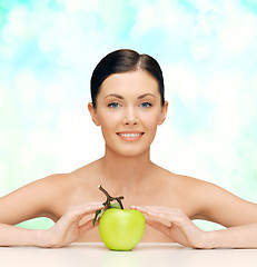 Image showing beautiful woman with green apple