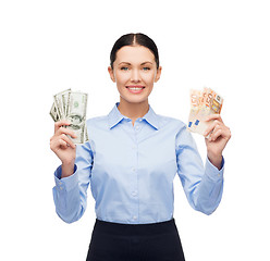 Image showing businesswoman with dollar and euro cash money