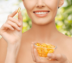 Image showing beautiful woman with omega 3 vitamins