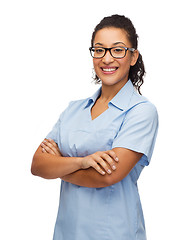 Image showing smiling female african american doctor or nurse