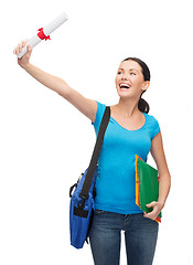 Image showing smiling student with bag and folders