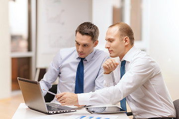 Image showing two businessmen having discussion in office