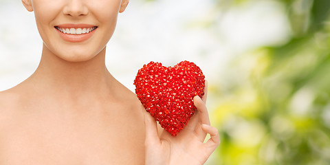 Image showing beautiful woman with red heart