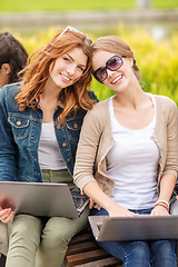 Image showing two female students with laptop computers