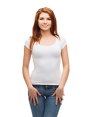 Image showing smiling teenager in blank white t-shirt