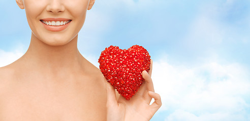 Image showing beautiful woman with red heart