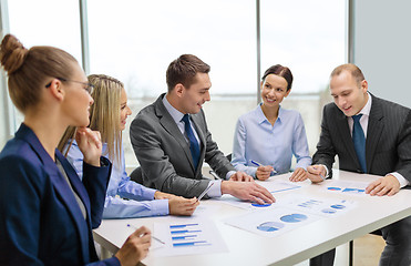 Image showing smiling business team at meeting
