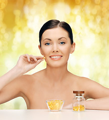 Image showing beautiful woman with omega 3 vitamins