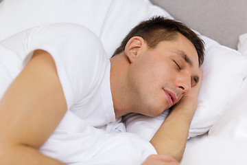 Image showing handsome man sleeping in bed