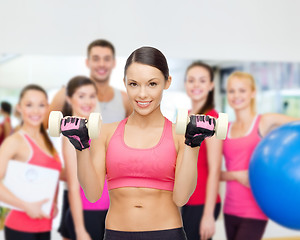 Image showing personal trainer with group in gym