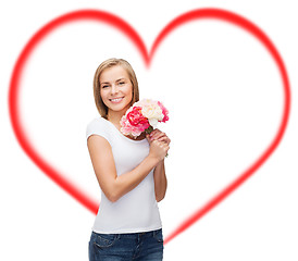 Image showing smiling woman with bouquet of flowers