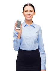 Image showing smiling businesswoman with spartphone blank screen