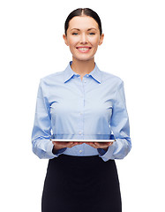 Image showing smiling businesswoman with blank tablet screen