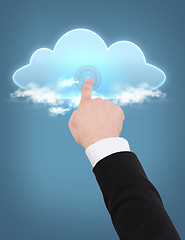 Image showing man hand pointing at cloud