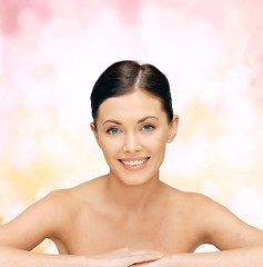 Image showing face and hands of beautiful woman