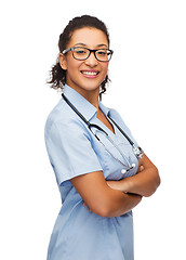 Image showing smiling female african american doctor or nurse