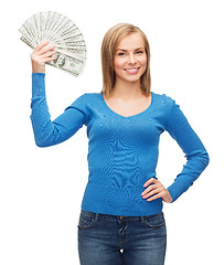 Image showing smiling girl with dollar cash money