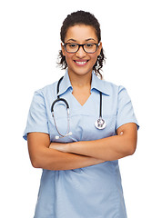 Image showing smiling female african american doctor or nurse