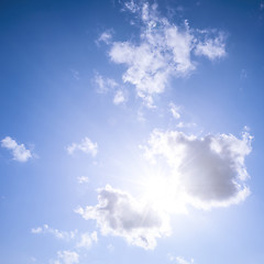 Image showing Blue sky with sun and clouds