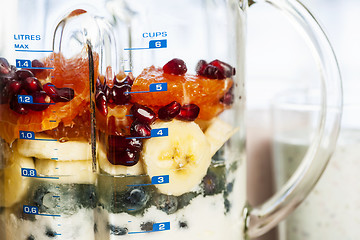 Image showing Blender with fruit and yogurt for smoothies