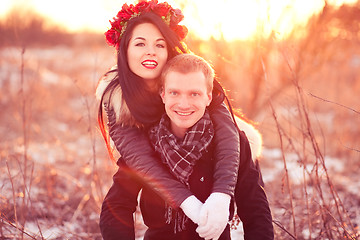 Image showing Happy young couple smiling and hugging