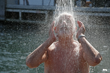 Image showing Showering