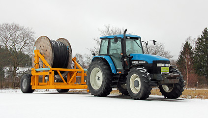 Image showing New Holland 8160 Tractor with Power Cable on Trailer