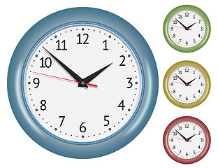 Image showing Set of wall mechanical clocks.