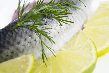 Image showing Fillet herring with onion and lemon