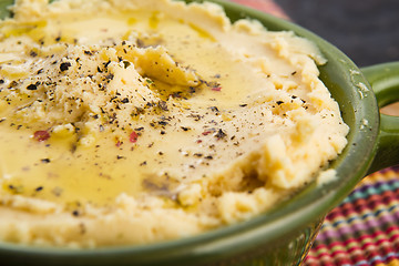 Image showing A bowl of creamy hummus