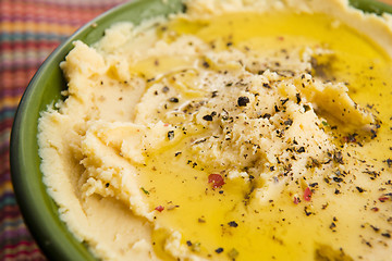 Image showing A bowl of creamy hummus