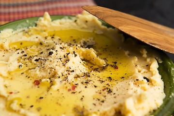 Image showing A bowl of creamy hummus