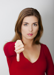 Image showing Woman with thumbs down