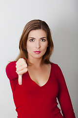 Image showing Woman with thumbs down
