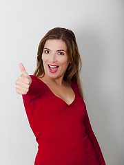 Image showing Happy woman with thumbs up