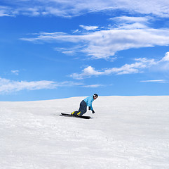 Image showing Snowboarder in winter mountains