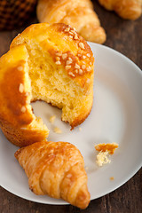 Image showing fresh baked muffin and croissant mignon