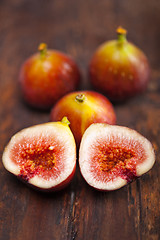 Image showing fresh figs over old wood