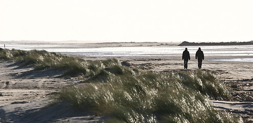 Image showing People walking on the beach Island of Fanoe in Denmark