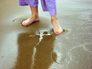 Image showing Feet in the sand