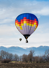 Image showing Multicolored Balloon in the blue sky