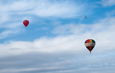 Image showing Multicolored Balloons in the blue sky