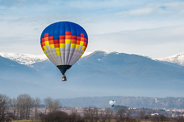 Image showing Multicolored Balloon in the blue sky