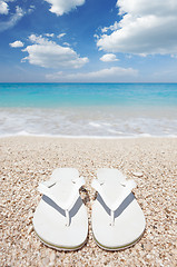 Image showing Flip flops on the beach