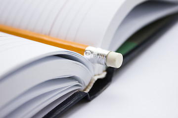 Image showing Pencil on a book