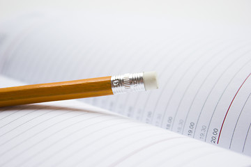 Image showing Pencil on a book