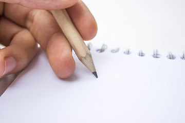 Image showing Pencil on a book