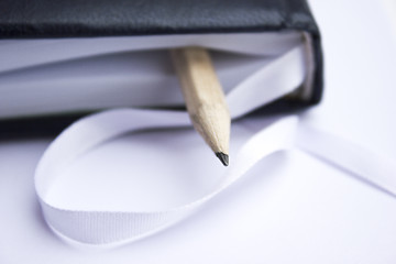 Image showing Pencil on a book